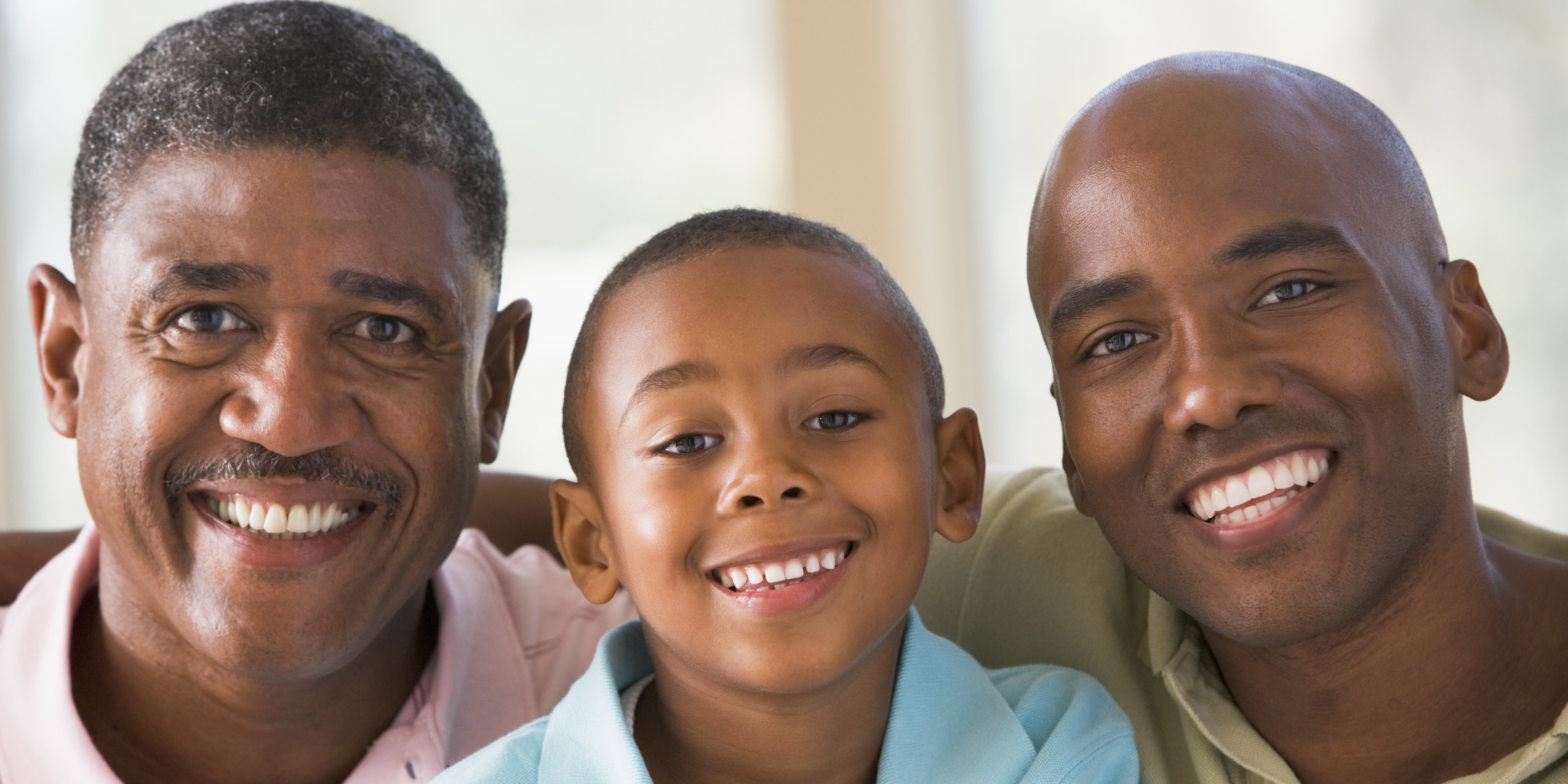 Older man, boy, and man who are happy with the dentists and dental service at Family Dental Care in Temple Hills, MD
