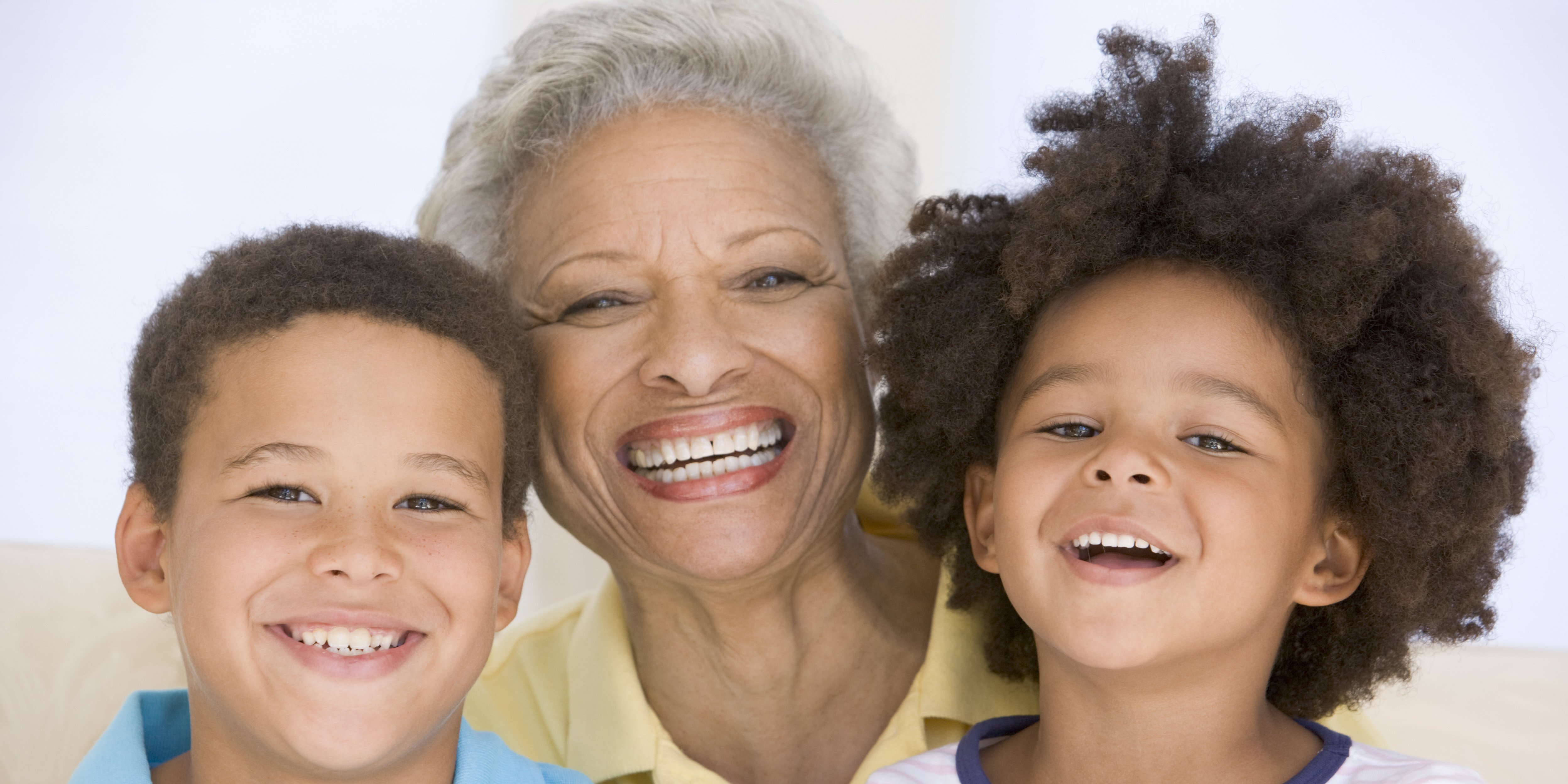 Boy, older woman, and girl who are happy with the dentists and dental service at Family Dental Care in Temple Hills, MD